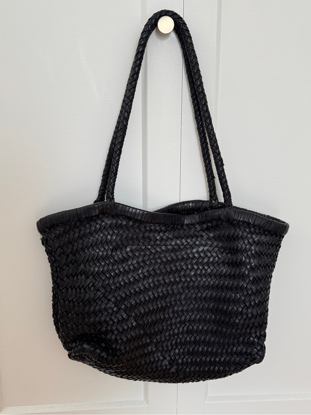 black woven leather tote bag